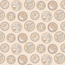 Clothworks Guess How Much I Love You Badges Light Caramel Fabric